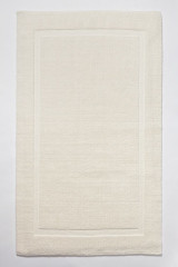 Batex Avani, двухсторонний квадратный коврик из 100% биохлопка, размер 55x65 см, цвет кремовый